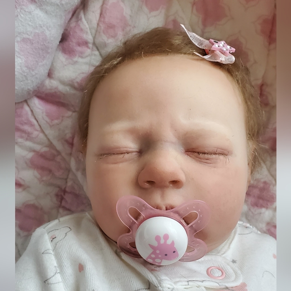 Artist painted reborn newborn baby